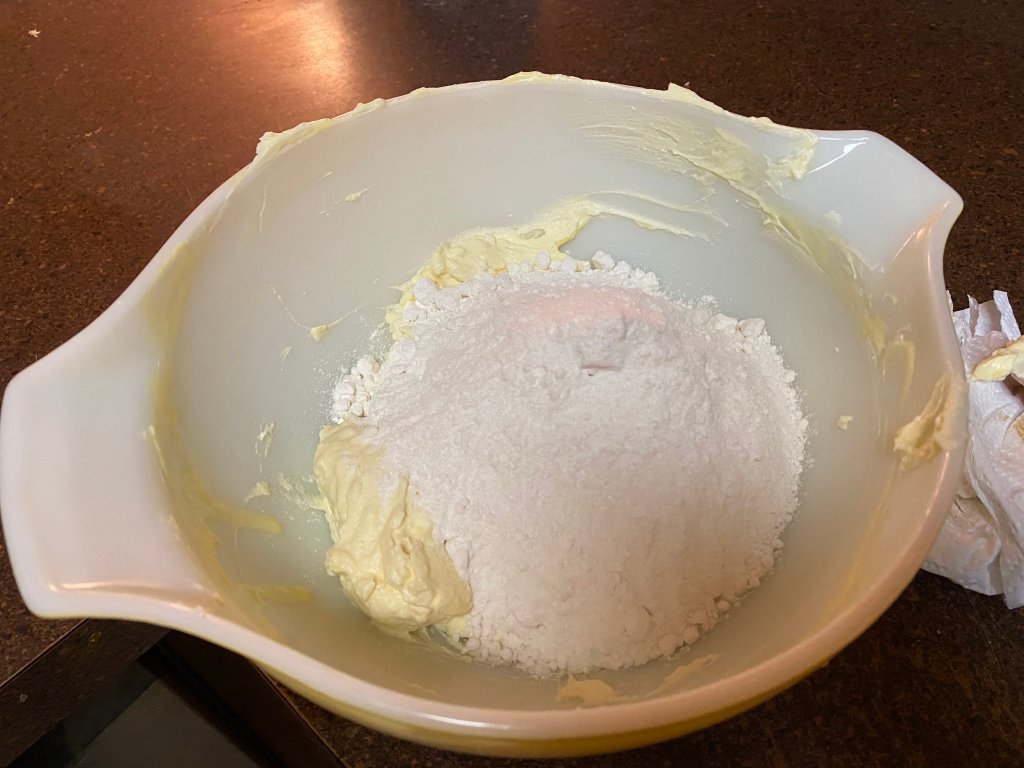 Half the bag of yellow cake mix added into the batter. 