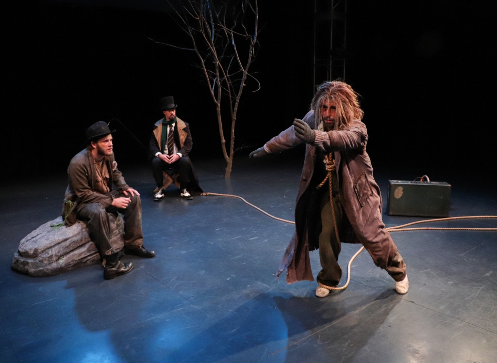 A road, a stone, a tree: From left to right, Gabe Reitemeier, Sean Ardor as Pozzo and M. Can Yasar as Lucky (photo by Will Hollerung, courtesy of the University of South Carolina Department of Theatre and Dance).