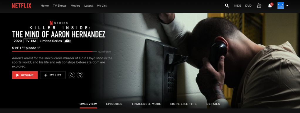 A portrayal of Aaron Hernandez on a phone in prison, one example of many reenactments featured in the limited series. Screen capture by Jessica Collins
